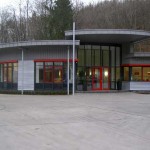 Zink Doppelstehfalztechnik, Alu-Wellfassade und Zink Steckfalzpaneele