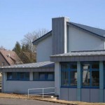 Dach in Doppelstehfalztechnik aus Zink vorbewittert, Fassade in Winkelstehfalztechnik auch Zink vorbewittert