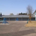 Dach in Doppelstehfalztechnik aus Zink vorbewittert, Fassade in Winkelstehfalztechnik auch Zink vorbewittert