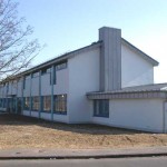 Dach in Doppelstehfalztechnik aus Zink vorbewittert, Fassade in Winkelstehfalztechnik auch Zink vorbewittert