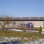 Flachdachabdichtung mit PVC-Dachbahnen und Tragschale aus Trapezblechen